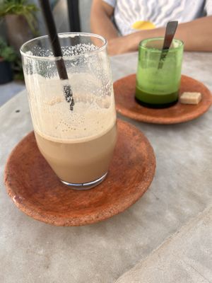 Iced banana latte and hot pistachio latte with soy milkk  at NBTAHOUSE in Tangier