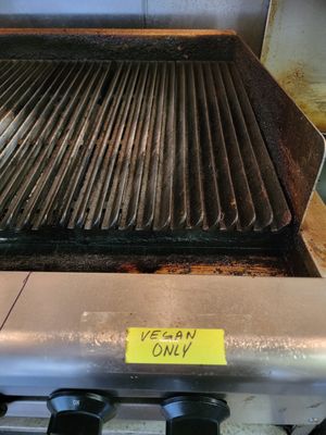 Dedicated grill area for vegan/vegetarian cooking. at Burger Vibe in Houston