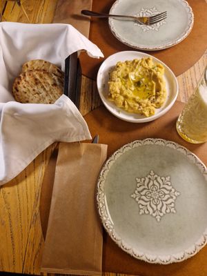 Fava appetizer with fresh olive oil on top and with warm pita at Theta in Athens