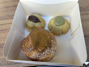 Nutella cookie, pistachio cookie and New York roll with biscoff   at Pastelería Málaga Vegana in Malaga