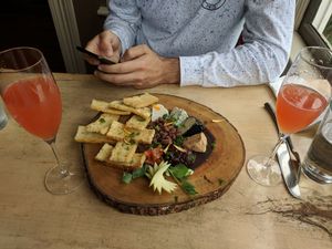 Every time we come here, I make sure to get the cheese platter. It is not often that you can go to a restaurant and enjoy a cheese platter as a vegan, so I make sure to indulge when I am here! The fig jam is to die for! at Mike's Cafe and Wine Bar in San Juan Island