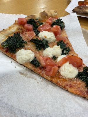 With vegan cheese and kale  at iPizzaNY - Times Square in New York City