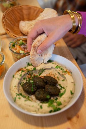 Hummus falafel pita salad and pickles at The Hummus Kitchen in Aljezur