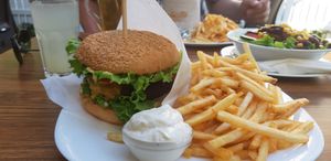 Vegan burger with vegan mayo and french fries at Loving Hut in Maribor