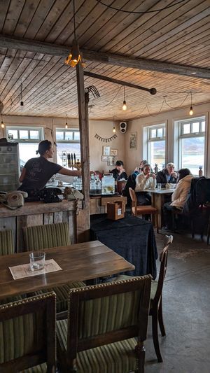 Downstairs. Food is served on the left. at Gisli Eirikur Helgi Kaffihûs Bakkabrædra in Dalvik