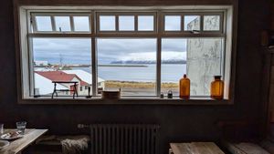 Plenty of seating upstairs with excellent views at Gisli Eirikur Helgi Kaffihûs Bakkabrædra in Dalvik