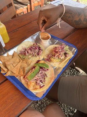 Tacos come with chips and homemade mild salsa.   at Totally Taco in Roatan
