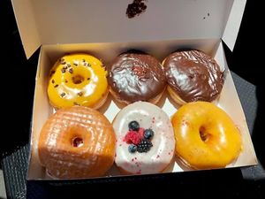 My choices. They are all very good. The Compassion Fruit and the Strawberry Lab are super good. (Strawberry Lab on lower left corner). at Donut Friend - Highland Park in Los Angeles
