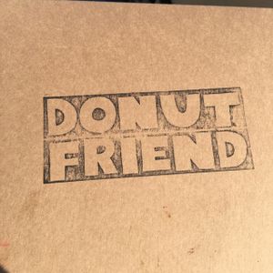 Cool logo on the box at Donut Friend - Highland Park in Los Angeles
