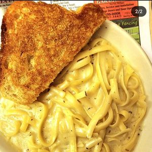 Alfredo and garlic bread at Old Hamlin Restaurant in Ludington