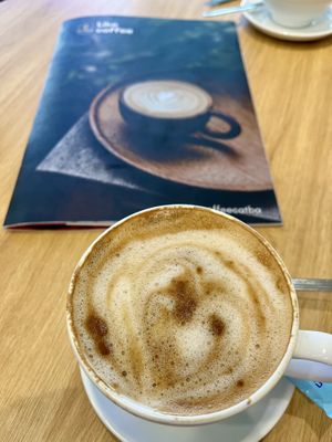 Cappuccino with oat milk  at LIKE COFFEE - Happy Garden in Cat Ba