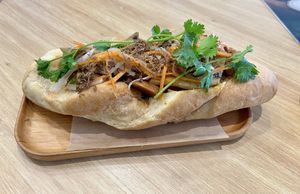 Bánh mì with vegan sausage and ham  at LIKE COFFEE - Happy Garden in Cat Ba