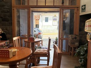 Cafe interior looking out  at Indie Cafe & Concept Store - Teatro in Cusco