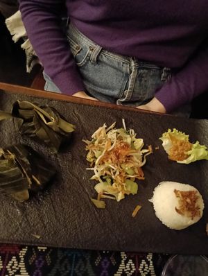 Tofu and tempeh in coconut milk and banana leaf at Cinta Rasa in Turin