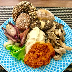 Hummus, muhammara, salad and breads at Crescendo in Dubai