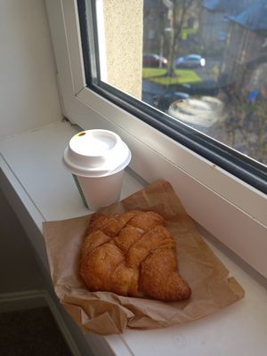 Coconut flat white and vegan crossiant at Noch Coffee Co in Dundee