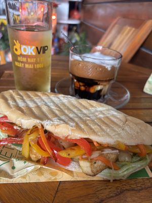 Complimentary tea, Vietnamese Iced coffee with SOY milk, Vegan Banh Mi   at Cafe 16A in Ha Long