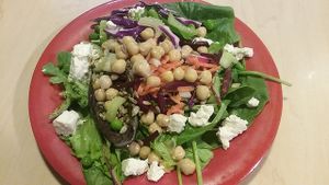 Salad with chickpeas, veggies and tofu. They sometimes have a asian ginger soup station with tofu so I got tofu from there. at Sweet Tomatoes in Naples