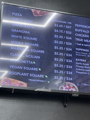   at Village Square Pizza in New York City