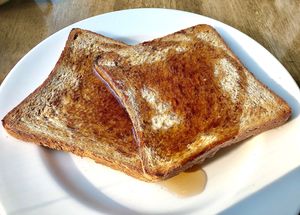 Toast and maple syrup  at Ostro in Dubai