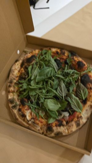 (Unfortunately blurry) photo of the vegan queen pizza at Mama Pizza Kuta Lombok in Kuta