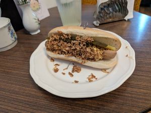 Hotdog mit Sauerkraut, BBQ Soße und Rostzwiebeln at Cafe Hibiskus in Cologne
