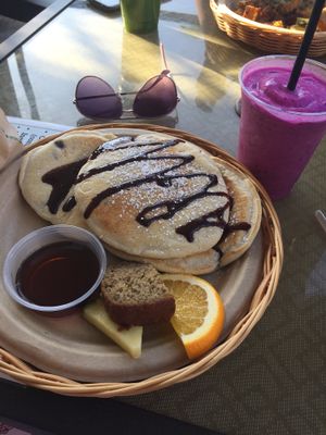 Chocolate Chip Pancakes & a Dragonfruit Smoothie = Heaven! at Evolution Bakery and Cafe in Kailua Kona