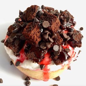 Cream Cheese Frosting, Brownie Bites, Chocolate Chips, Chocolate Sauce, and Strawberry Jam at Cinnaholic in Odessa