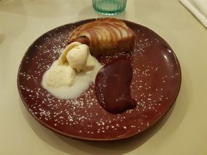 Tarte bourdaloue, glace à l'huile d'olive(le meilleur) et coulis de fruit rouge. at Tête d'ail in Rennes