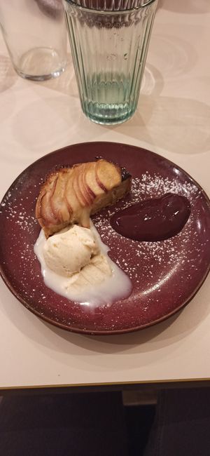 Olive oil ice cream, red berries sauce and peach bourdaloue tart. All very good, especially the tart and the ice cream. at Tête d'ail in Rennes