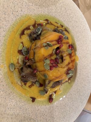 Golden harvest pumpkins steak - this was delicious! It was cooked to perfect and the sauce was beautiful.  at Acai Plant Based Hotel & Restaurant in Rhodes