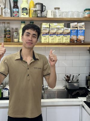 Friendly owner Dan Tit   at Tit Coffee  in Cat Ba