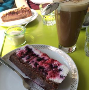 chai latte and raw coconut berry cake  at Taracafe in Regensburg