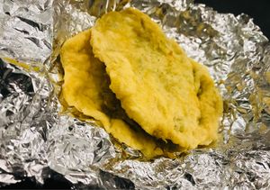 Doubles (vegan fried dough filled with curried chickpea & potato) at Sunrise Caribbean in Washington