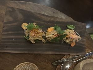 Flatbread with hummus & oyster mushrooms   at Sakti Dining Room in Mambal