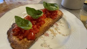 Bruschetta di pomodori, il profumo di basilico si sentiva da lontano   at Conzato in Matera