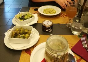 Sprouts, green salad with potatoes,gnocchi and pasta at So What?!? in Rome