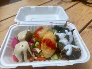 Falafel, Kuba Halab rice balls, and Dolma vine leaves. at Nohadra's Kitchen in Brunswick