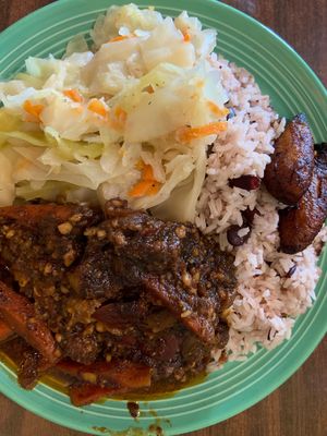 Tempeh, rice and beans, cabbage, and plantains at Reggae Shack Cafe in Gainesville