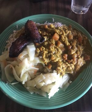 Curry tempeh with rice cabbage and plantains at Reggae Shack Cafe in Gainesville