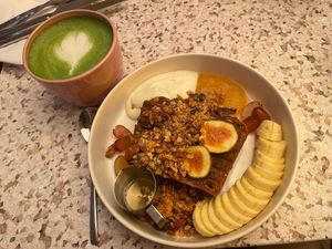 Espresso banana bread with Granola and Skyr (small plate) and Matcha Latte at neon in Muenster