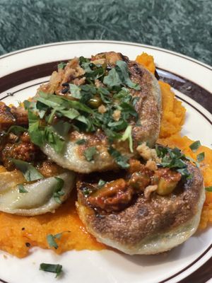 Dumpling on the carrot puree   at Gosari Express in Seoul