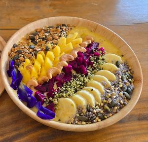 Yellow smoothie bowl at The butterfly effect. in Chiang Mai