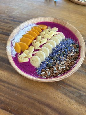 Dragonfruit based smoothie bowl with mango, banana, pineapple, coconut and mixed seeds  at The butterfly effect. in Chiang Mai