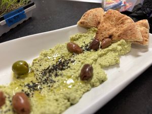 Vegan: Fresh Garbanzo Bean Hummus. Warm pita, marinated olives, EVOO at Vin 909 Winecafé in Annapolis