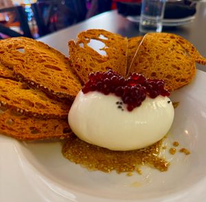 Vegetarian: Burrata Cheese. Sesame syrup, hibiscus pearls, pano de sesame crostini. at Vin 909 Winecafé in Annapolis