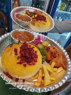 Blackberry pilaf with vegetable fillet at Beynolmelal Vegan Restaurant in Rasht