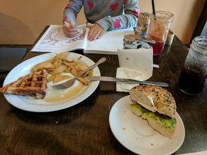 Apple pie waffle and vegan sausage bagel at Nectar Cafe in Portland