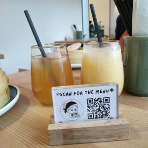 Homemade iced tea (peach + coconut milk) at NaiNai Bao in Cologne