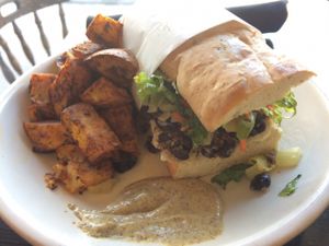 Po'Boy sandwich with housemade black bean tempeh, bread and mustard! at Whyld Ass in Flagstaff
